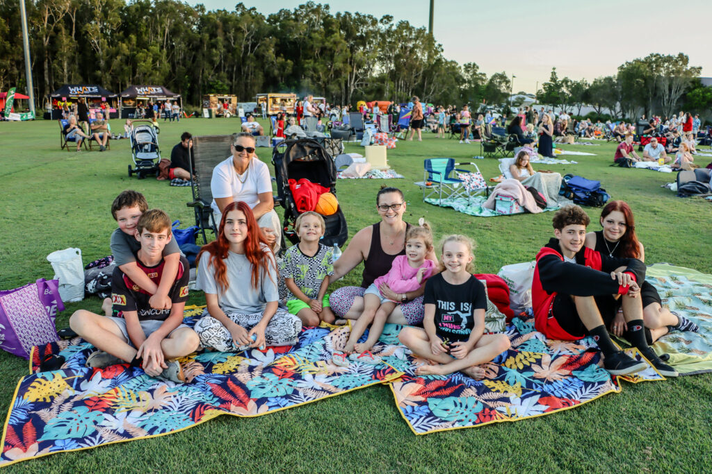 Photo of movie goers at the park