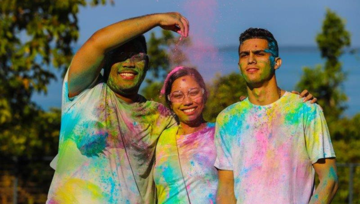 Group photo of friends in colorful shirts